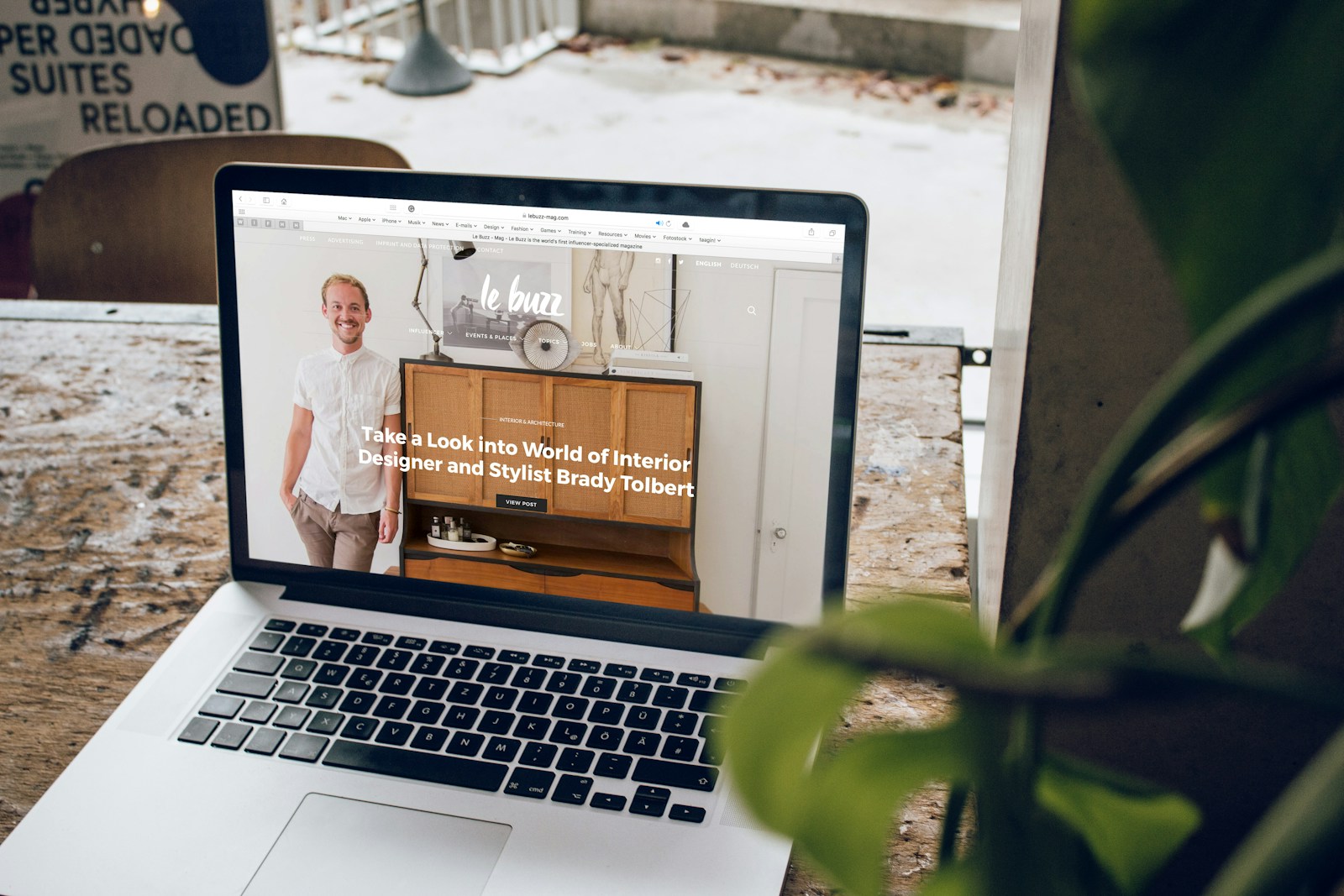 Quad Cities small business owner reviewing website builder pricing on a laptop