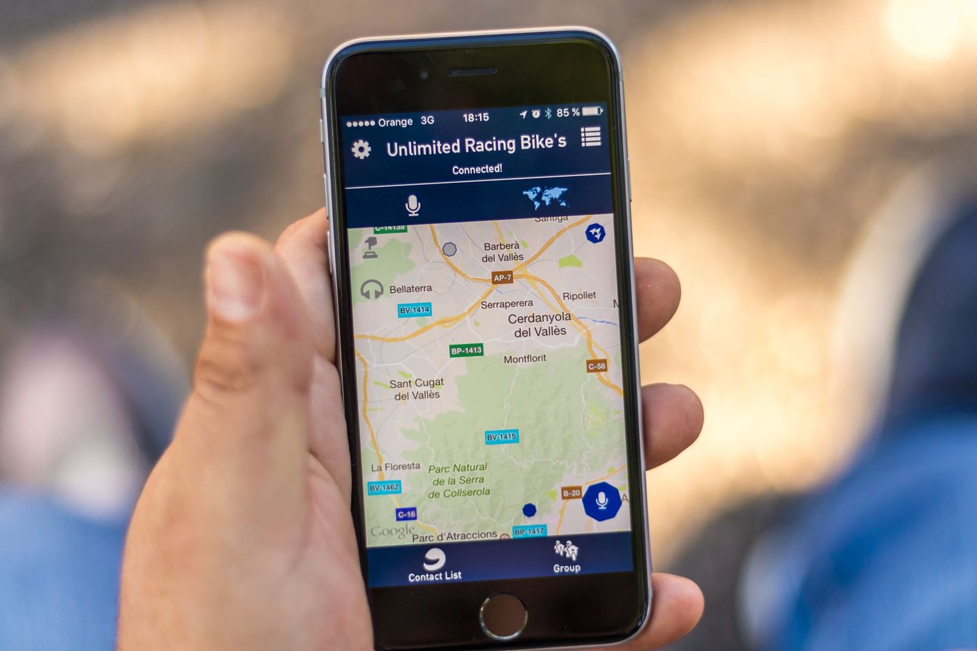Hand holding a smartphone showing local results on a map