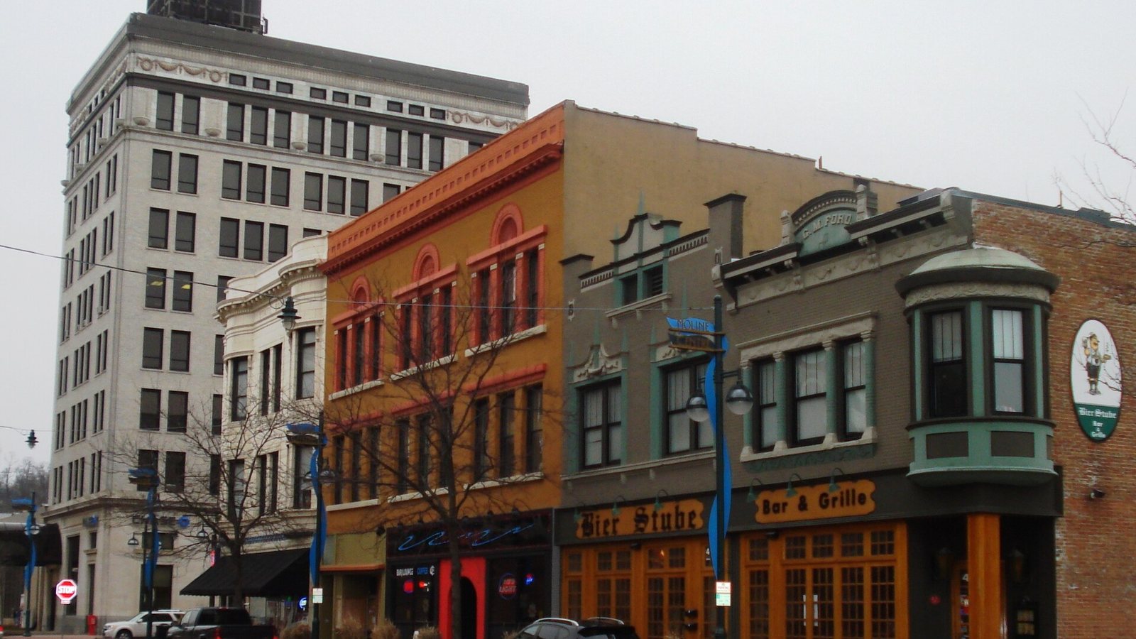 Storefronts and the clock tower along 15th Street in downtown Moline, Illinois